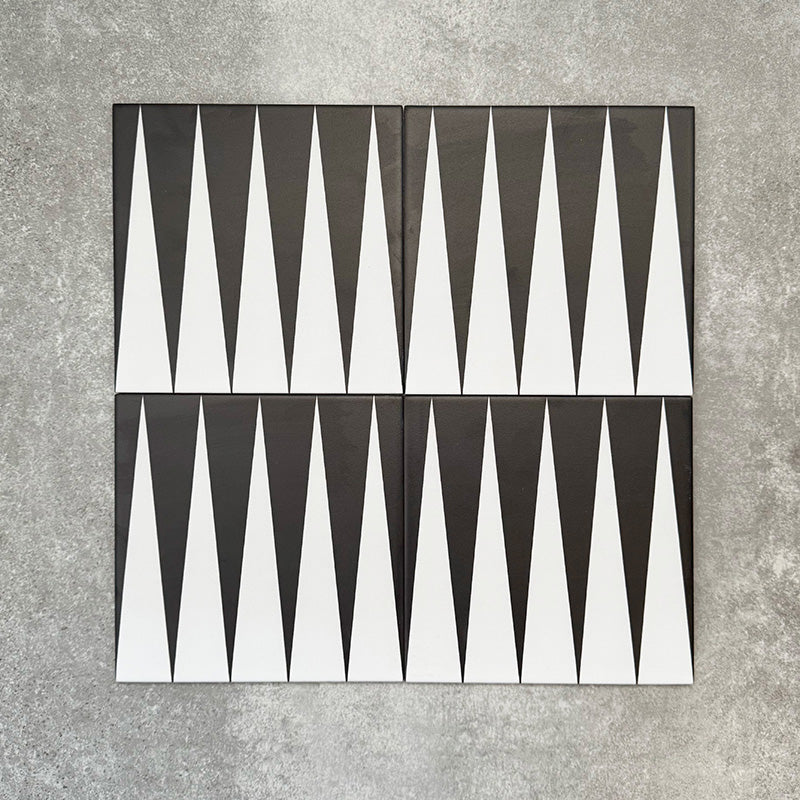 Four Almeria Backgammon Moroccan-style porcelain wall and floor tiles displayed together in a bold black and white geometric pattern, 20x20cm.