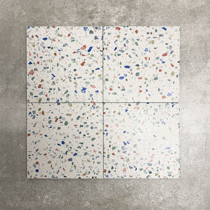 Gelato Tutti Frutti 25x25cm terrazzo-style porcelain tile, featuring a light neutral base scattered with colourful terrazzo flecks for a playful, contemporary finish.