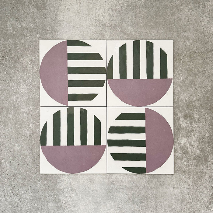 Abstract Serit Patterned Tiles in a 20x20cm format, displayed in a repeated grid layout to showcase the bold geometric design. Soft pink semicircles are paired with deep green horizontal stripes on a crisp white background, creating a playful yet contemporary pattern ideal for feature walls, floors or statement splashbacks.