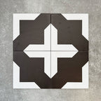 Four Almeria Cathedral Moroccan-style porcelain wall and floor tiles displayed together in a bold black and white geometric pattern, 20x20cm.