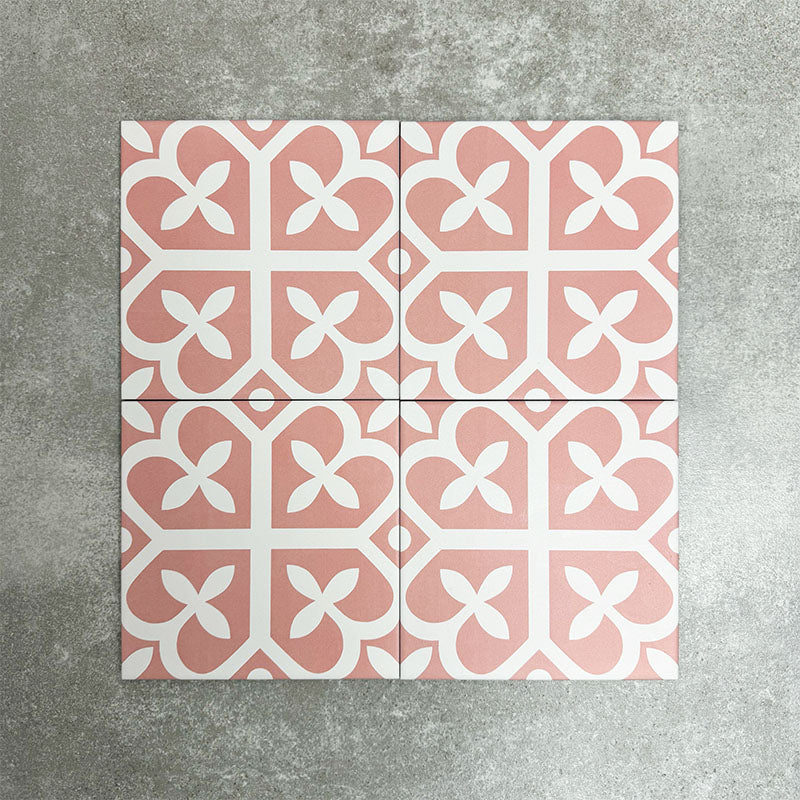 Ivy Rose Victorian Moroccan style 20x20cm patterned tiles, shown as four tiles together to highlight the repeating soft pink and white geometric pattern.