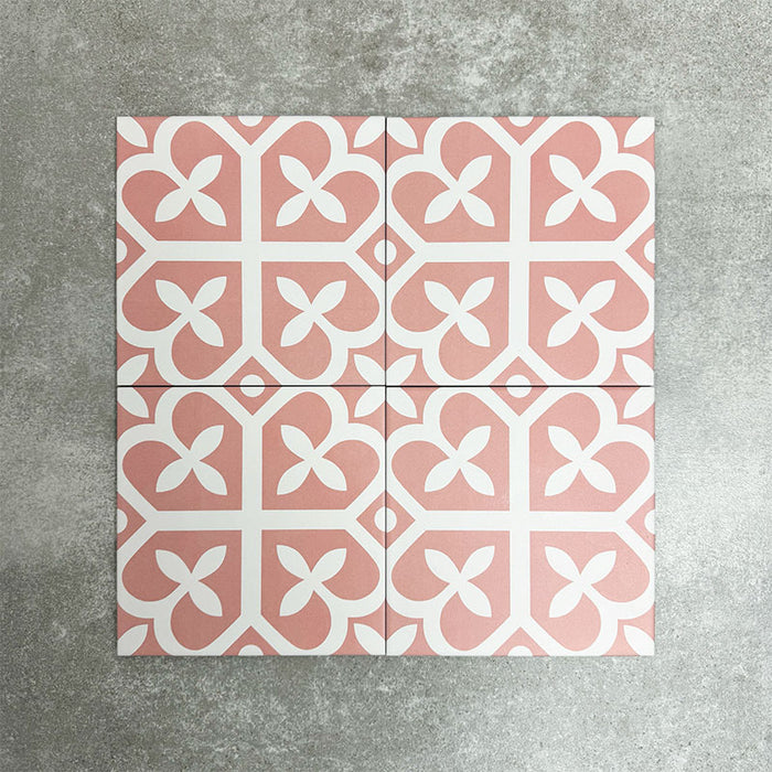Ivy Rose Victorian Moroccan style 20x20cm patterned tiles, shown as four tiles together to highlight the repeating soft pink and white geometric pattern.