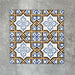 Viscount Maestro 20×20cm Victorian-style porcelain wall and floor tiles laid in a repeating ornate geometric pattern with floral detailing in blue, white and warm ochre tones, shown as a full tile layout with subtle tonal variation and floral styling.