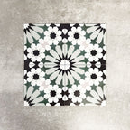 Fez Orchid Moroccan style porcelain tile with a geometric star pattern in soft green, black and white, 20cm x 20cm