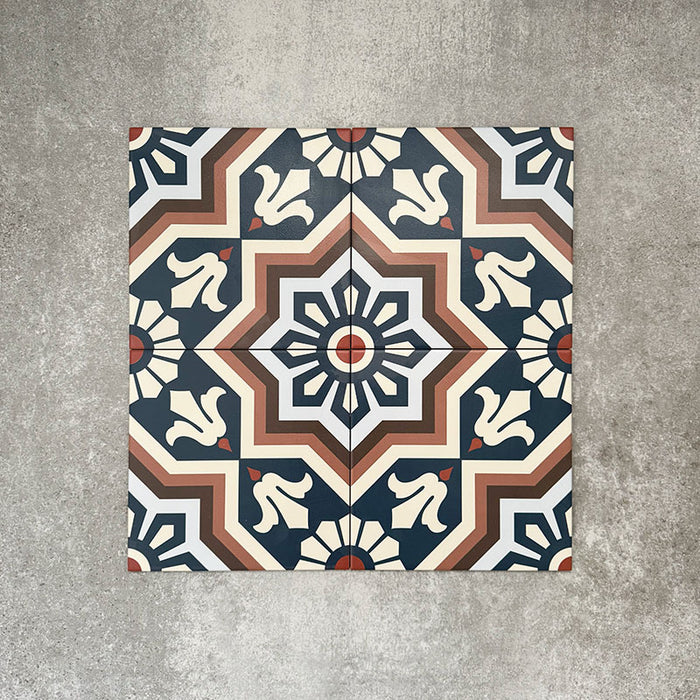 Balthazar Grand 20×20cm Moroccan-style porcelain tiles, showing the full encaustic-inspired geometric design in deep blue, warm brown and cream tones, ideal for creating bold statement floors or feature walls.