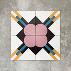Abstract Contori Patterned Tiles in a 20x20cm format, displayed in a repeated grid layout to showcase the intricate geometric design. Soft blush pink floral motifs are framed by intersecting lines in mustard yellow, teal and charcoal on a crisp white background, creating an elegant, decorative pattern ideal for feature walls, floors or statement splashbacks.