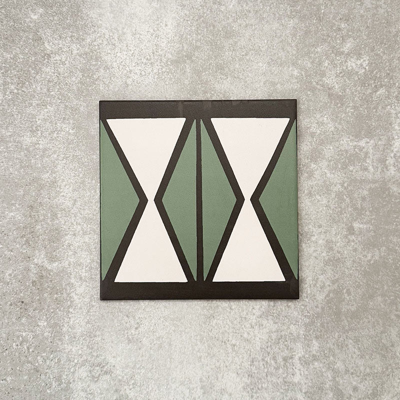 Single Abstract Hourglass Patterned Tile in a 20x20cm format, featuring a bold geometric hourglass design in muted green and soft cream tones with charcoal detailing. A contemporary patterned tile ideal for feature walls, floors or statement splashbacks.
