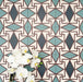 Abstract Iris Patterned Tiles in a 20x20cm format, displayed in a repeated grid layout to showcase the intricate geometric design. Soft teal and cream tones are contrasted with deep blue diamond motifs and fine red detailing, creating a bold, decorative pattern ideal for feature walls, floors or statement splashbacks.