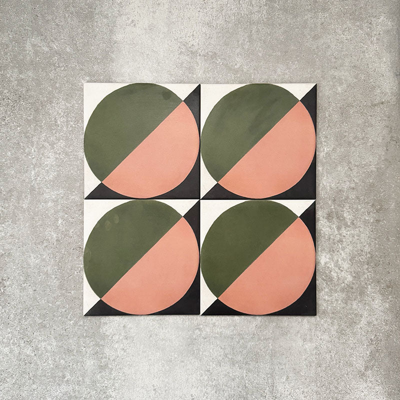 Abstract Moon Patterned Tiles in a 20x20cm format, displayed in a repeated grid layout to showcase the bold geometric circular design. The pattern combines muted green and soft blush tones with black corner accents, creating a striking yet balanced look ideal for feature walls, floors or decorative splashbacks.