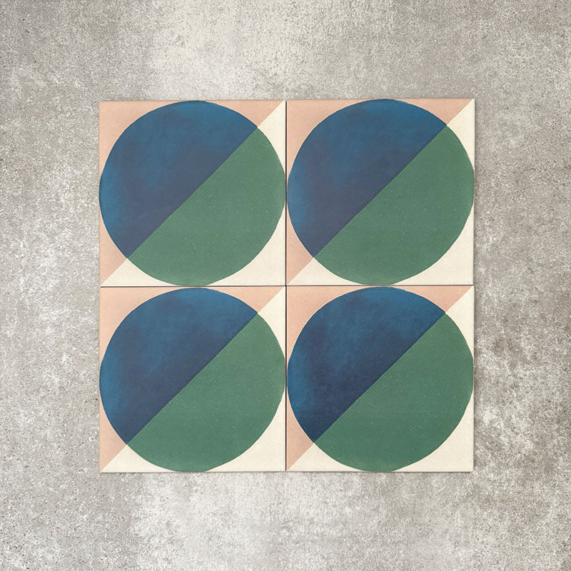 Abstract Ocean Patterned Tiles in a 20x20cm format, displayed in a repeated grid layout to showcase the bold geometric circular design. Deep blue and rich green tones are balanced with soft neutral corners, creating a fresh, contemporary look ideal for feature walls, floors or decorative splashbacks.