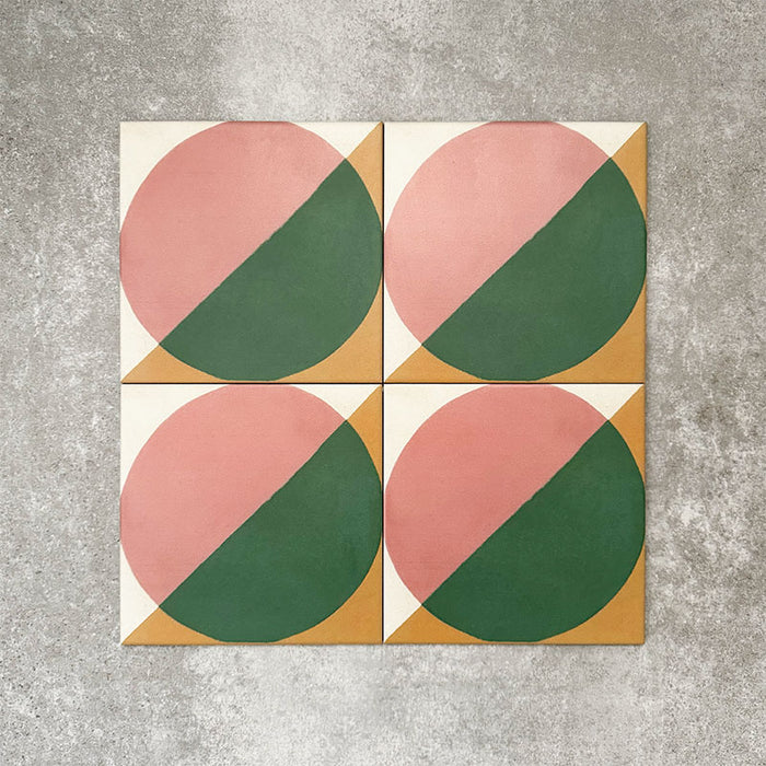 Abstract Pablo Patterned Tiles in a 20x20cm format, shown in a repeated grid layout to highlight the bold geometric circular design. The pattern combines soft pink and deep green tones with warm ochre accents, creating a striking yet balanced look ideal for feature walls, floors or decorative splashbacks.