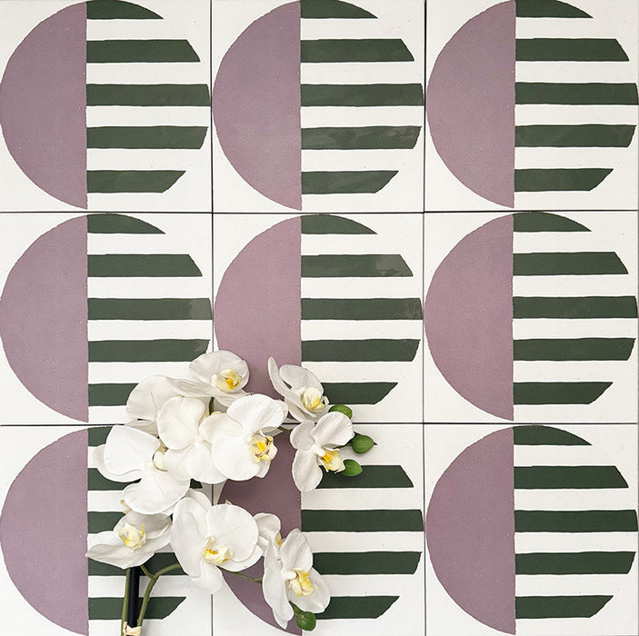 Abstract Serit Patterned Tiles in a 20x20cm format, displayed in a repeated grid layout to showcase the bold geometric design. Soft pink semicircles are paired with deep green horizontal stripes on a crisp white background, creating a playful yet contemporary pattern ideal for feature walls, floors or statement splashbacks.