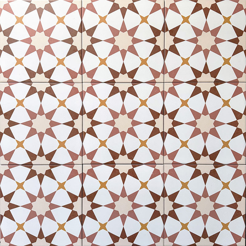 Agadir Cotto Moroccan-style 20x20cm porcelain floor tiles laid in a repeating geometric star pattern, showcasing warm terracotta, white and soft yellow tones in a coordinated tile layout.