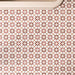 Agadir Cotto 20cm x 20cm Moroccan style tiles, showcasing an intricate geometric star pattern in warm terracotta, burgundy and white tones, creating a bold repeating design across the bathroom floor.