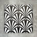 Four Almeria Casablanca Moroccan-style porcelain wall and floor tiles displayed together in a bold black and white fan pattern, 20x20cm.