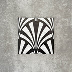 Single Almeria Casablanca Moroccan-style porcelain tile featuring a bold black and white fan pattern, 20x20cm, suitable for wall and floor use.