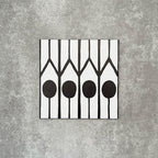 Single Almeria Felis Moroccan-style porcelain tile featuring a black and white geometric dot and line pattern, 20x20cm, suitable for wall and floor use.