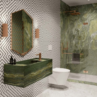 Bathroom featuring Almeria Jilani White Moroccan-style wall and floor tiles in a geometric maze pattern, 20x20cm, paired with green stone finishes and brass accents.