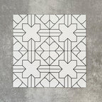 Four Almeria Palace Moroccan-style porcelain wall and floor tiles displayed together in a refined black line geometric pattern on a white base, 20x20cm.