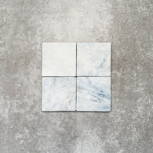 Product image of Amalfi Square Azul Vintage Marble wall and floor tiles in an 11cm x 11cm format, featuring soft blue and white marble effect detailing, subtle veining and gently rounded vintage-inspired edges.