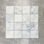 Product image of Amalfi Square Azul Vintage Marble wall and floor tiles in an 11cm x 11cm format, featuring soft blue and white marble effect detailing, subtle veining and gently rounded vintage-inspired edges.