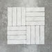 Product image of Amalfi Brick Carrara Vintage Marble wall and floor tiles in a 5.4cm x 22cm format, arranged in a basketweave pattern, showcasing a soft white marble effect surface with subtle tonal variation.