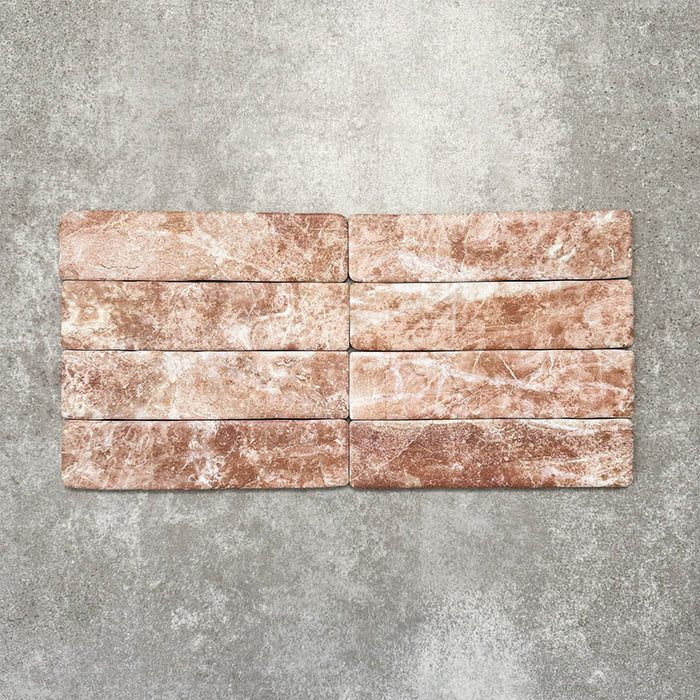 Product image of Amalfi Brick Rouge Vintage Marble wall and floor tiles in a 5.4cm x 22cm format, showcasing warm blush pink marble effect detailing and natural tonal variation.