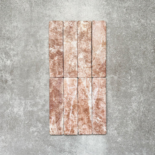 Product image of Amalfi Brick Rouge Vintage Marble wall and floor tiles in a 5.4cm x 22cm format, showcasing warm blush pink marble effect detailing and natural tonal variation.