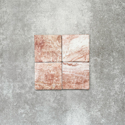 Product image of Amalfi Square Rouge Vintage Marble wall and floor tiles in an 11cm x 11cm format, featuring warm blush pink marble effect detailing, natural tonal variation and softly rounded edges.