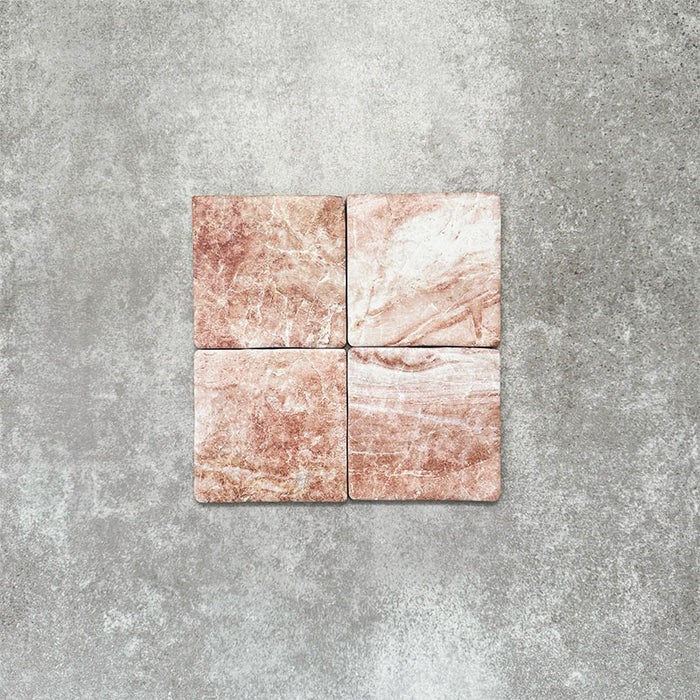 Product image of Amalfi Square Rouge Vintage Marble wall and floor tiles in an 11cm x 11cm format, featuring warm blush pink marble effect detailing, natural tonal variation and softly rounded edges.
