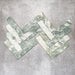 Product image of Amalfi Brick Salvia Vintage Marble wall and floor tiles in a 5.4cm x 22cm format, arranged in a herringbone pattern, showcasing green and white marble effect detailing with natural veining and tonal variation.