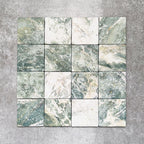 Product image of Amalfi Square Salvia Vintage Marble wall and floor tiles in an 11cm x 11cm format, featuring green and white marble effect detailing, natural veining and softly rounded vintage-inspired edges.