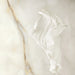 Close-up of Anastasia Pearl Onyx Matt 60 × 120cm stone effect tiles, showcasing soft cream tones with delicate gold veining, styled with a flowing white fabric to highlight the surface texture and elegant finish.