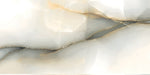 Close-up of Anastasia Pearl Onyx Polished 60 × 120cm stone effect tile, featuring soft cream tones with flowing grey and gold veining, creating a natural, layered pattern with a high-gloss polished finish.