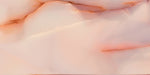 Close-up of Anastasia Rose Onyx Matt 60 × 120cm stone effect tile, featuring soft pink tones with flowing gold veining, creating a gentle, layered pattern with a smooth matt finish.