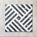 Flat lay of Art Deco Black & White marble effect patterned porcelain tiles 44 × 44cm, arranged to highlight the repeating geometric layout. The contrast between deep black marble effect segments and crisp white lines creates a bold, interlocking pattern with strong visual structure and movement.