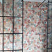 Shower wall featuring Athens Multicoloured Hexagon Patchwork 17x15cm Moroccan-style tiles, showcasing a geometric hexagon pattern in soft pastel and earthy tones for a vibrant yet balanced bathroom feature.