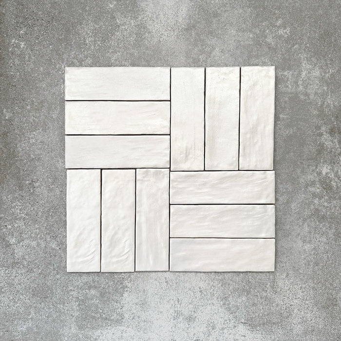 Basketweave layout featuring Zellige Oyster Brick Moroccan-style ceramic tiles in a 6.5 × 20cm format, combining horizontal and vertical placement to highlight the handmade texture, soft oyster tones and subtle surface variation of the glazed tiles.