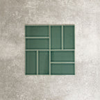 Pimlico Golders Green 7.5 × 15cm ceramic wall tiles with a crackle glaze finish, shown in a basketweave layout highlighting rich green tones, subtle texture and versatile design for kitchens and bathrooms.
