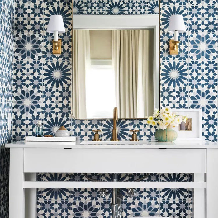 Bathroom featuring Souk Blue D 20×20cm Moroccan-style porcelain wall tiles in a blue, white and grey geometric pattern.