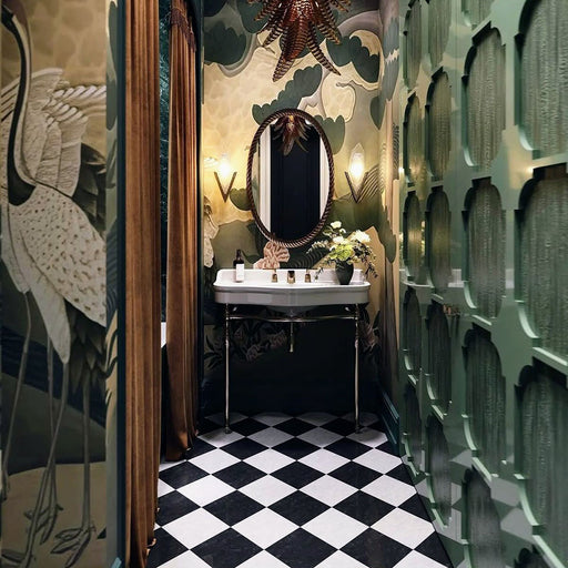 Bathroom setting featuring Manor Plain White Base 20x20cm tiles paired with contrasting black tiles in a classic chequerboard layout, creating a bold geometric floor, styled with rich wall tones and brass accents for a striking, timeless finish.