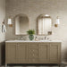 Bathroom setting featuring Benomar Canvas Moroccan style mini brick tiles in a 5x15cm format, finished in a soft matt surface. Laid in a horizontal brick pattern, the subtle tonal variation and handcrafted look create a gentle sense of texture across the wall.