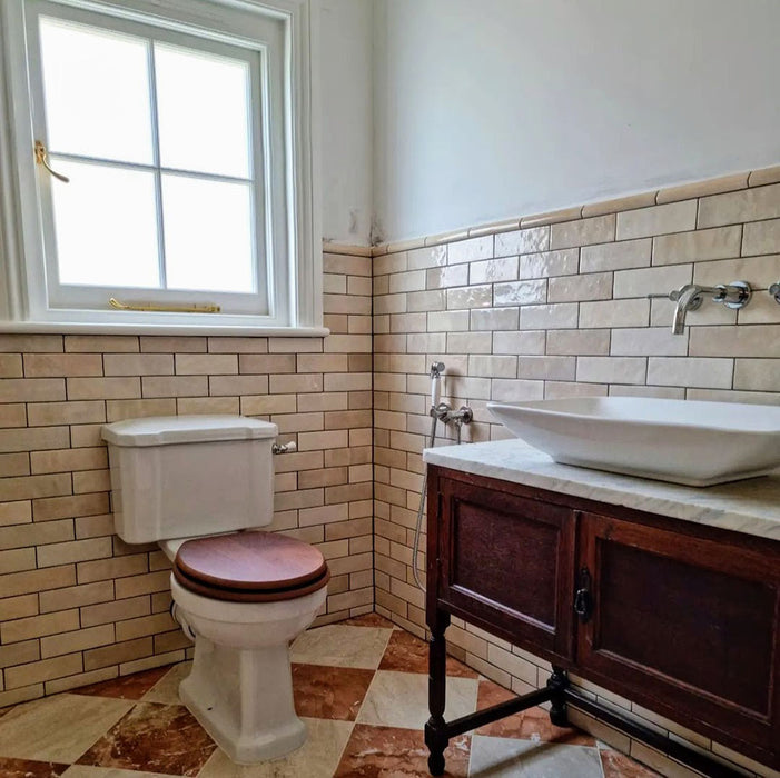 Zellige Bone Moroccan-style brick tiles in a bathroom, laid in a classic horizontal layout with warm neutral tones.