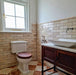 Zellige Bone Moroccan-style brick tiles in a bathroom, laid in a classic horizontal layout with warm neutral tones.