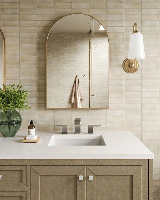 Bathroom setting featuring Benomar Canvas Moroccan style mini brick tiles in a 5x15cm format, finished in a soft matt surface. Laid in a horizontal brick pattern, the subtle tonal variation and handcrafted look create a gentle sense of texture across the wall.
