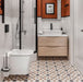 Bathroom setting featuring Viscount High Street 20x20cm Victorian style wall and floor tiles, showcasing a detailed geometric pattern in warm and neutral tones, paired with crisp white wall tiles, wood finishes and matte black fittings for a balanced, contemporary finish.