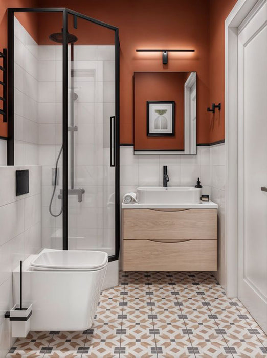 Bathroom setting featuring Viscount High Street 20x20cm Victorian style wall and floor tiles, showcasing a detailed geometric pattern in warm and neutral tones, paired with crisp white wall tiles, wood finishes and matte black fittings for a balanced, contemporary finish.
