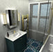 Bathroom interior featuring London Streets Baker Street 20x20cm Victorian Moroccan style floor tiles, styled with white herringbone wall tiles, brass fittings, green vanity unit and glass shower screen for a bold patterned bathroom floor.