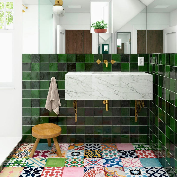 Bathroom interior featuring Fayrouz Patchwork 20×20cm Moroccan-style porcelain floor tiles, combining colourful geometric and floral patterns for a bold, decorative patchwork effect.