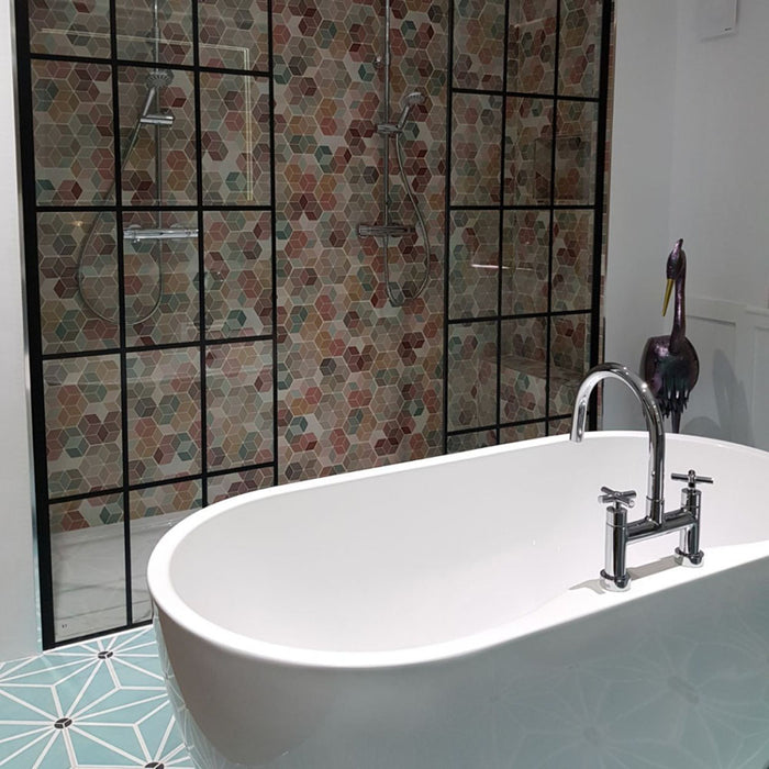 Shower wall featuring Athens Multicoloured Hexagon Patchwork 17x15cm Moroccan-style tiles, showcasing a geometric hexagon pattern in soft pastel and earthy tones for a vibrant yet balanced bathroom feature.